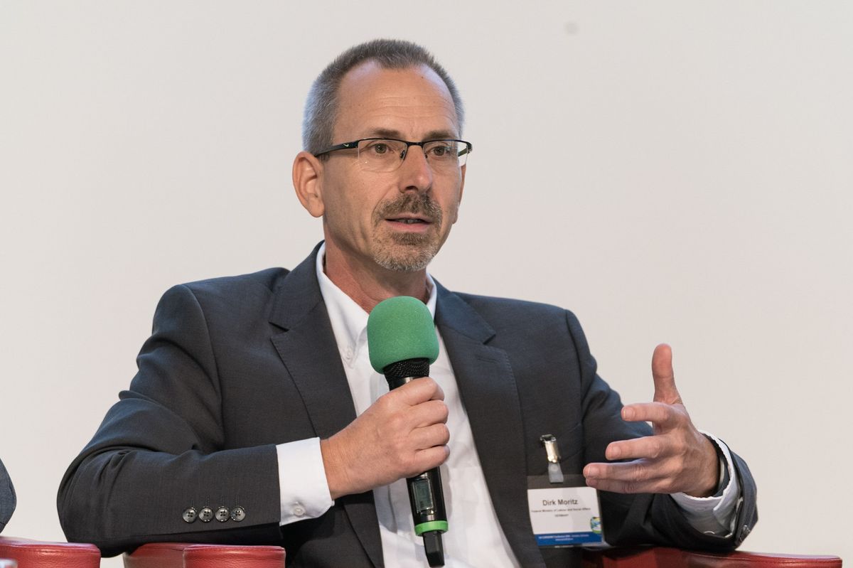 Dirk Moritz (BMAS) talking during the panel discussion