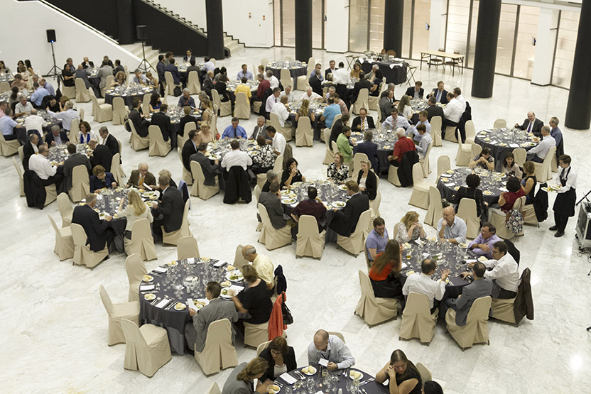 Around 20 dinner tables in a hotel atrium