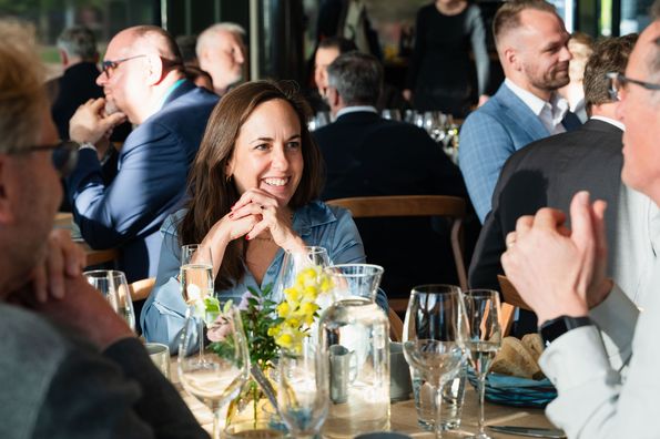 People talking during conference dinner