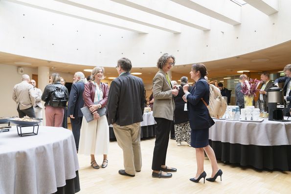 Conference participants talking during a break