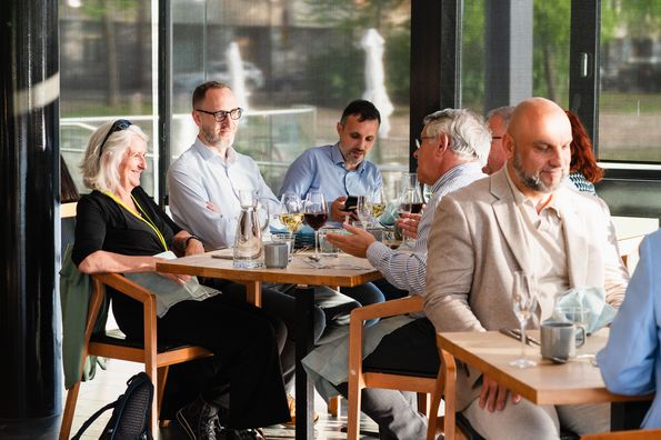 People talking during conference dinner