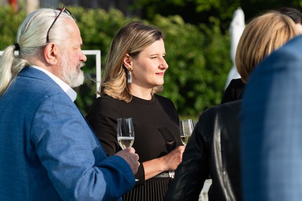 People talking during conference dinner